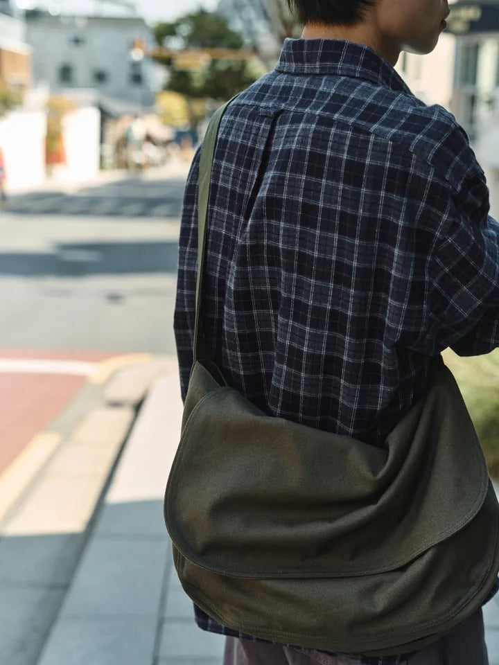 

A check shirt and purple denim between sun and shade — 6