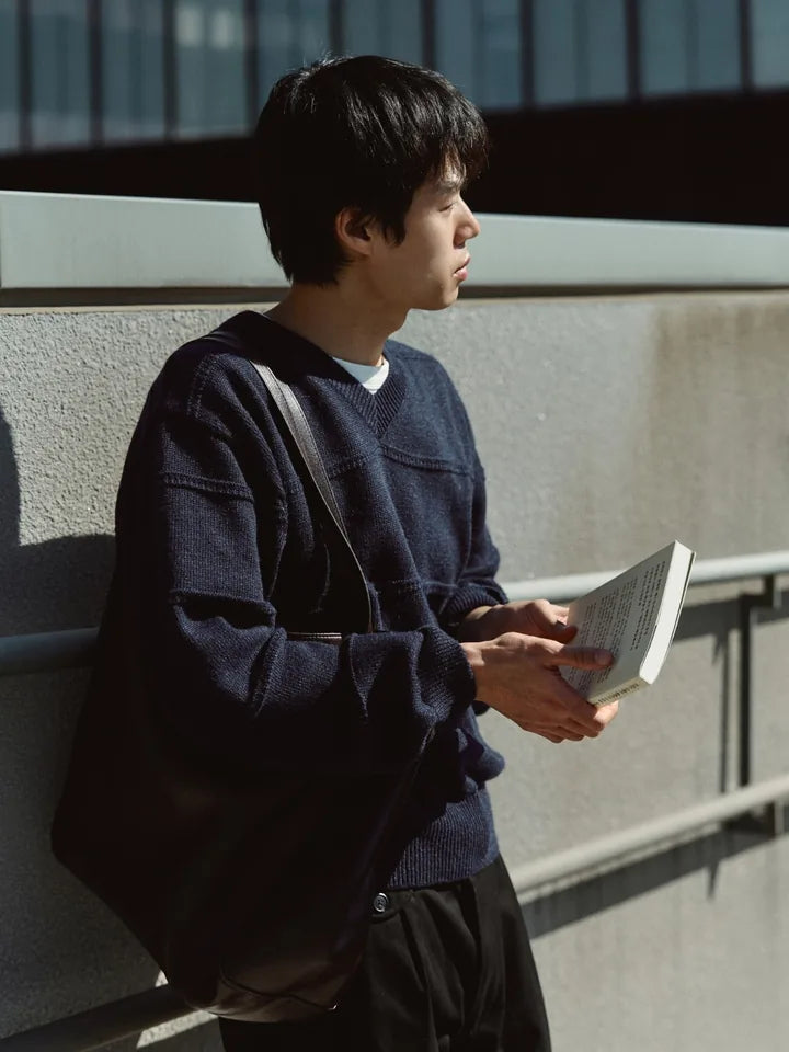 

A navy V-neck and black chinos on a clear afternoon — 4