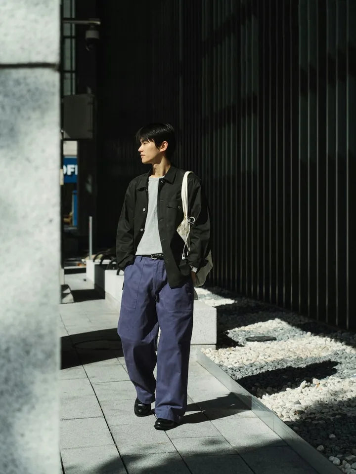 A charcoal jacket and blue pants on an afternoon in the alley — 4